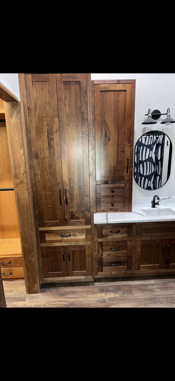 Custom walnut bathroom cabinetry